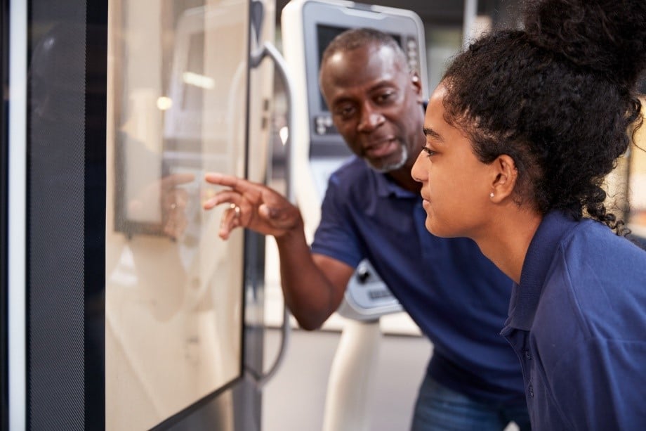 Senior engineer working with an apprentice